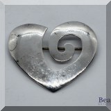 J062. Sterling silver heart shaped pin. - $28 
